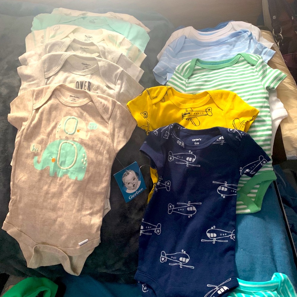 3 different sets of onesies new with tags